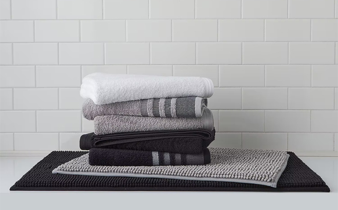 Home Expressions Solid Bath Towel Collection On Table
