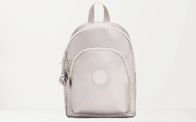 Kipling Womens Curtis Compact Convertible Backpack on a Gray Background Kipling Womens Curtis Compact Convertible Backpack on a Gray Background
