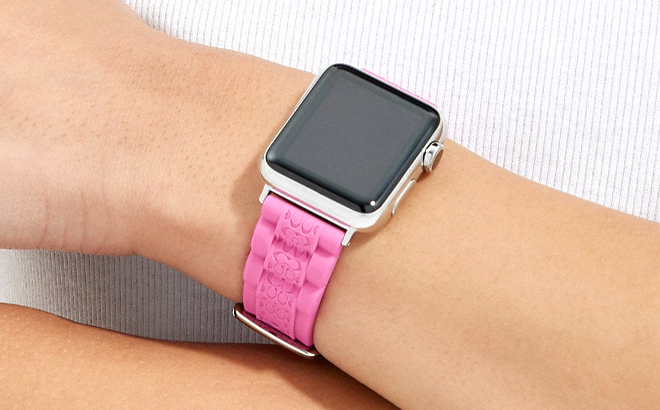 Lady wearing Coach Outlet Petunia Apple Watch Strap