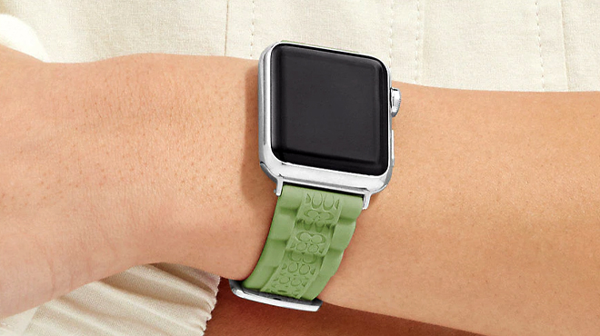 Lady wearing Coach Outlet Pistachio Apple Watch Strap