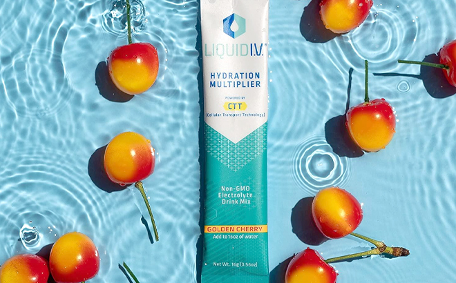Liquid I V Hydration Multiplier with Golden Cherry Flavor on Water with Fruit on the Side