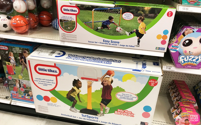 Little Tikes Soccer Set and Little Tikes Basketball Set on a Shelf at a Target Store