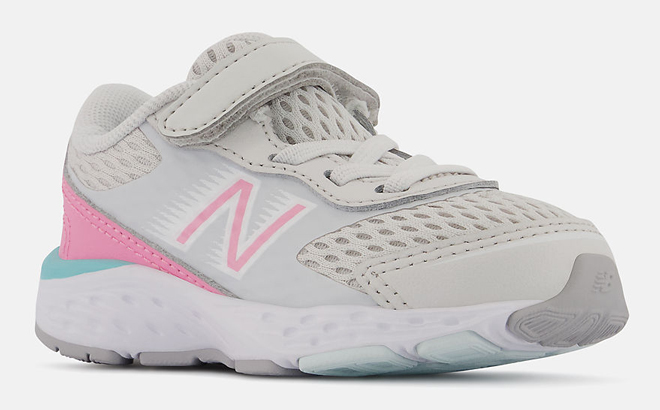 New Balance 680v6 Bungee Kids Shoes in Nimbus cloud with bubblegum and surf color