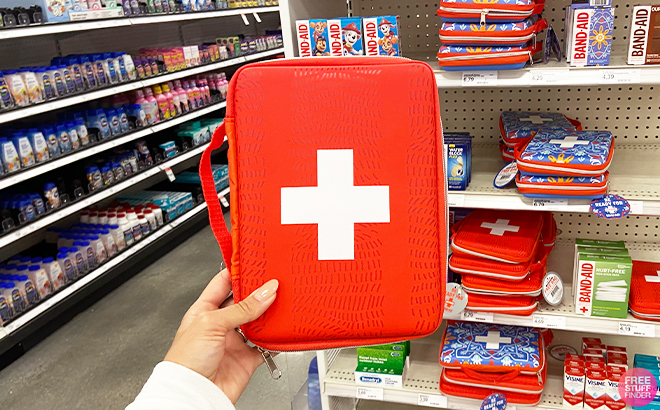 Person Holding Johnson And Johnson First Aid Bag