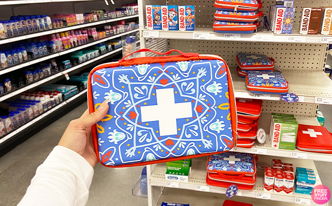 Person Holding Johnson And Johnson First Aid Bag At Target
