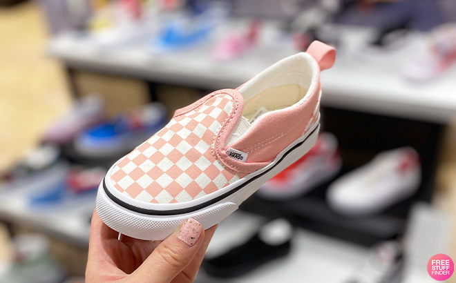 Person Holding VANS Kids Pink Checkered Shoes