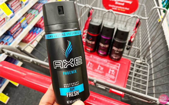 Person Holding an Axe Deodorant Body Spray Inside a Store