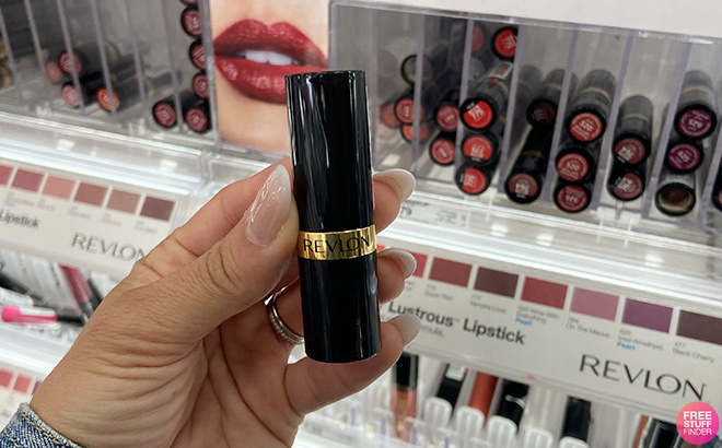 Hand Holding a Revlon Super Lustrous Lipstick