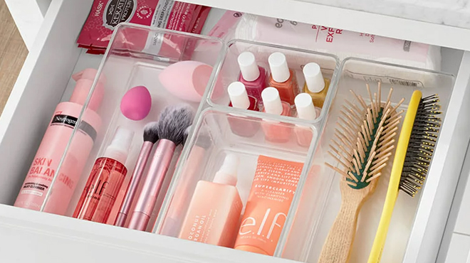 The Home Edit 10 Piece Clear Plastic Storage System with Beauty Items Inside a Cabinet