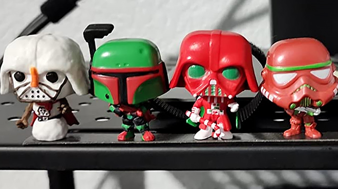 Three Figures from Funko Pop Star Wars Advent Calendar on a Computer Desk