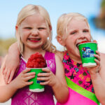Two Kids Eating Kona Ice