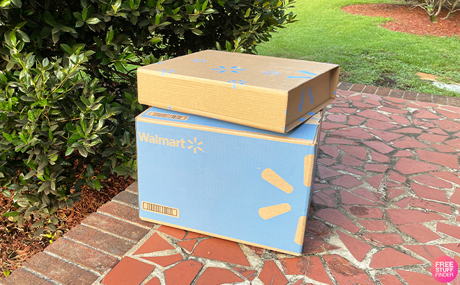 Two Walmart Grocery Boxes on the Front Porch of a Home