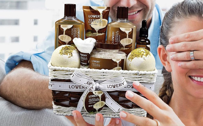 A Person Holding 9 Piece Set of Vanilla Coconut Home Spa Set