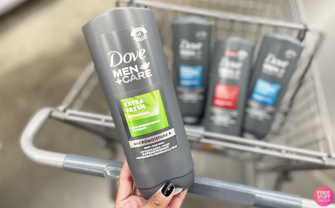 A Person Holding a Bottle of Dove MenCare Extra Fresh Body Wash