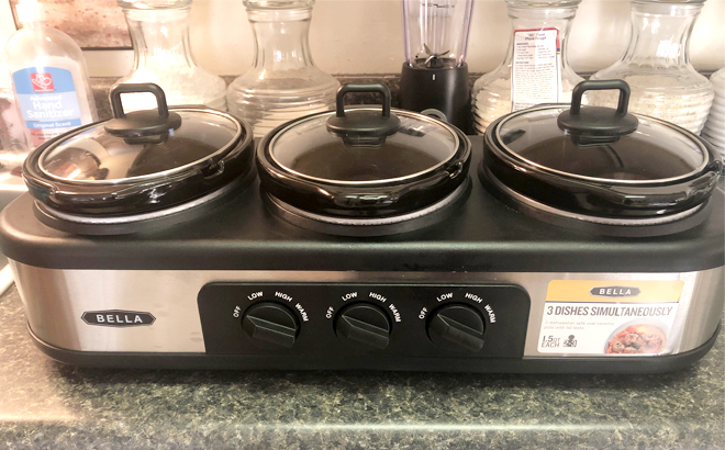 Bella Triple Slow Cooker on a Kitchen Countertop