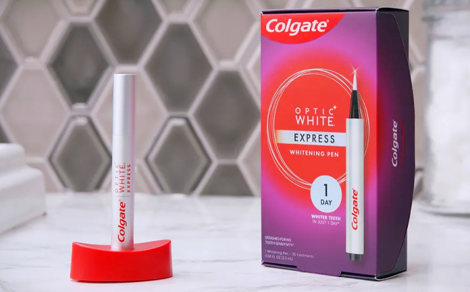 Colgate Optic White Express Teeth Whitening Pen on a Bathroom Countertop