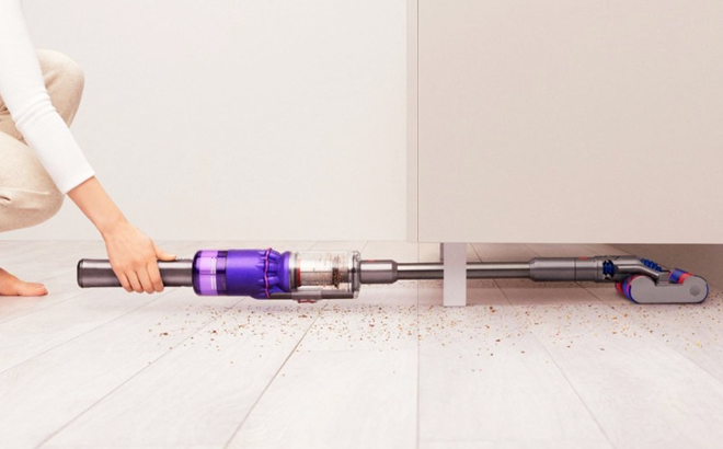 Dyson Omni Glide Cordless Vacuum with Woman