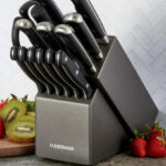 Farberware 15 Piece Kitchen Knife Block Set with Strawberries on a Table