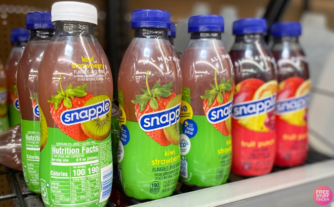 Five Snapple Drinks in Different Flavors on a Shelf