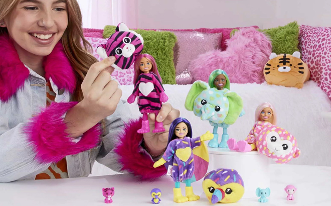 Girl Playing with Barbie Cutie Reveal Small Doll with Plush Costumes