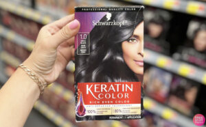 Hand Holding Schwarzkopf Keratin Hair Color Cream