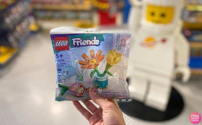 Hand Holding LEGO Friends Friendship Flower 84 Piece Set Hand Holding LEGO Friends Friendship Flower 84 Piece Set