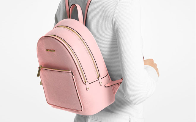 Model Wearing Michael Kors Adina Backpack in Pink Colour