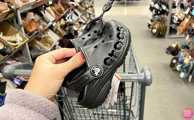 Person Holding Crocs Toddler Baya Clogs in Black Color