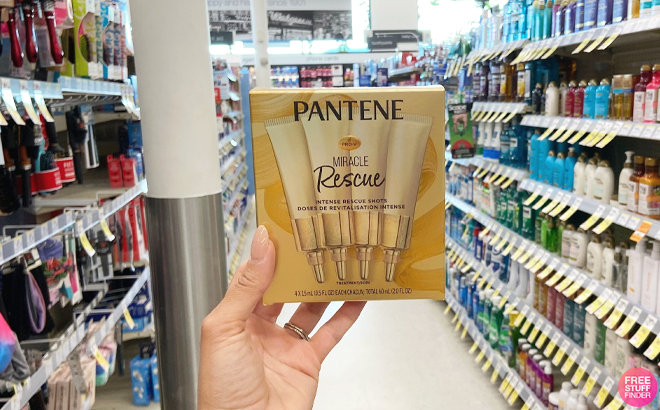 Person Holding Pantene Miracle Rescue Dry Hair Treatment Shots