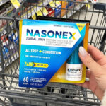 Person Holding a Nasonex 24HR Allergy Congestion Spary Bottle