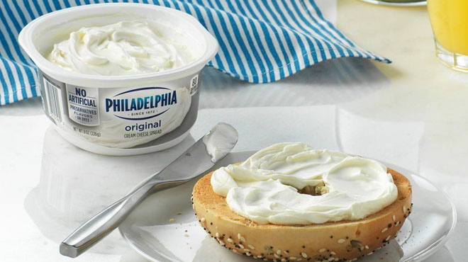 Philadelphia Cream Cheese on The Table with a Bagel