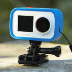 Polaroid Dual Screen Wifi Action Camera 4K 18mp in Blue Color on a Flat Stone