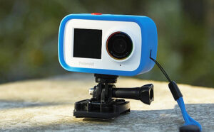 Polaroid Dual Screen Wifi Action Camera 4K 18mp in Blue Color on a Flat Stone