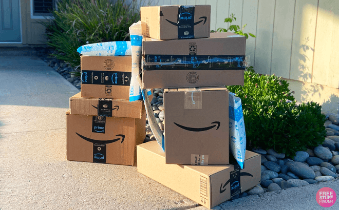 Stacked Amazon Prime Boxes Outside the House