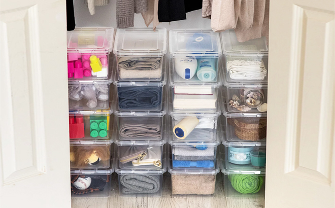Twenty Mainstays 5 Quart Stackable Boxes Filled with Things Inside the Closet