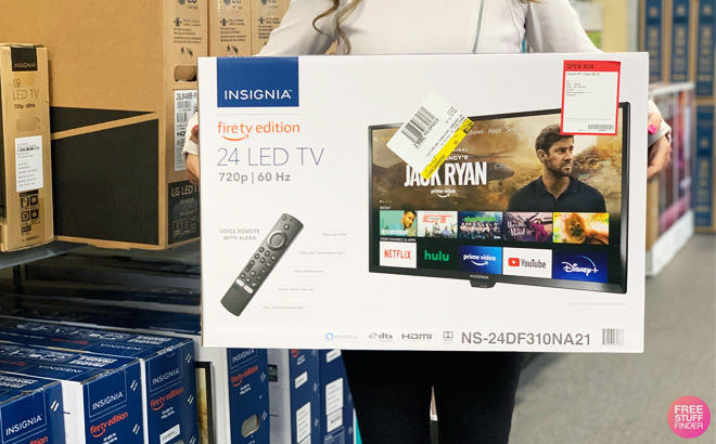 Woman Holding Insignia 24 Inch Fire TV
