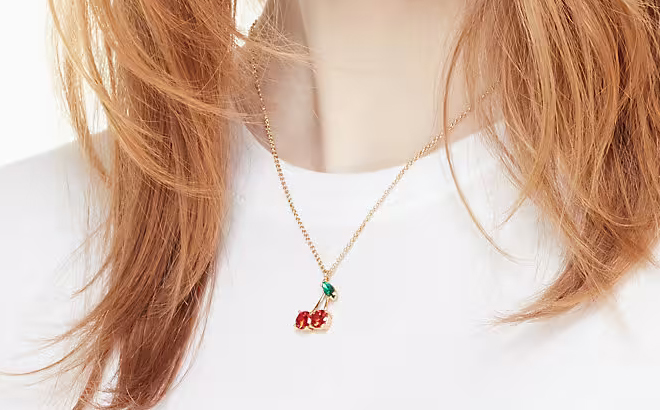 Woman Wearing a Kate Spade Cherry Mini Pendant Necklace