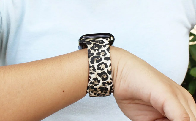 a Person Wearing an Apple Watch with Leopard Design Watch Band