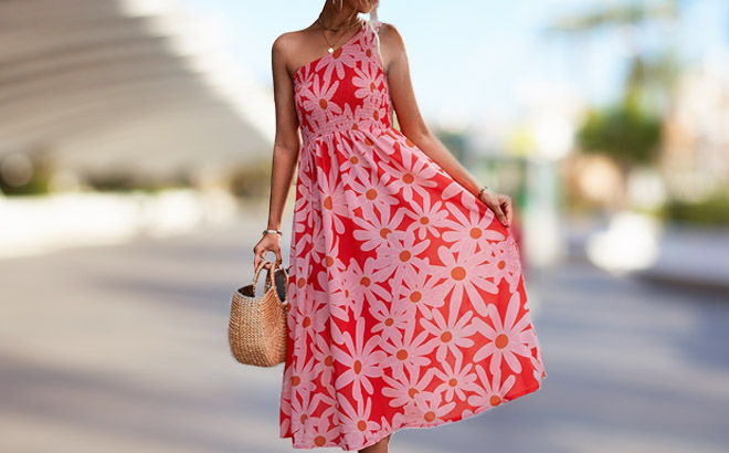 a Woman Wearing a One Shoulder Floral Print Dress Walking in a Street