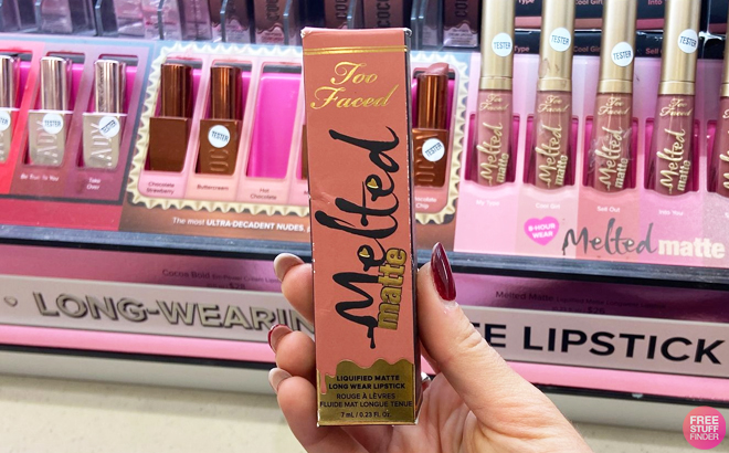 A Hand Holding Too Faced Melted Matte Liquid Lipstick