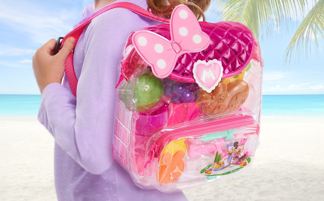 Child Holding Disney Minnie Mouse Backpack Picnic Set