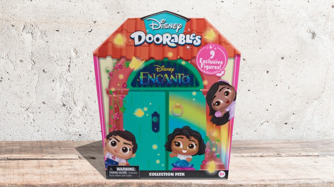 Disney 10 Piece Doorables Encanto Set on Wooden Surface
