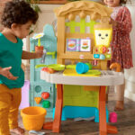 Fisher Price Laugh Learn Grow the Fun Garden to Kitchen Interactive Farm to Kitchen Playset for Toddlers with Music Lights and Learning Content
