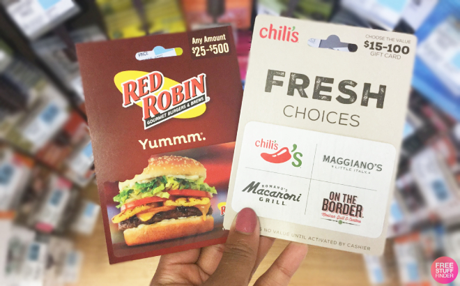 Hand Holding Red Robin and Chilis Gift Cards