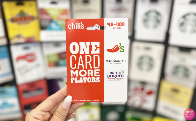 Hand Holding a Chilis Gift Card