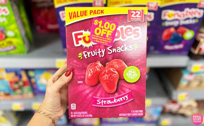 Hand Holding a Funable Fruity Snacks 22 Count