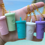 Person Holding Mini Studded Tumbler Keychains