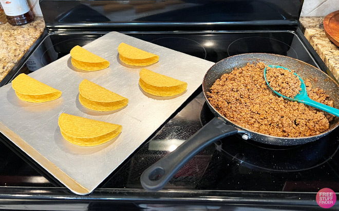 Taco Shells and Cooked Meat on a Stove