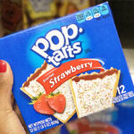 Woman Holding Pop Tarts Toaster Pastries Frosted Strawberry 12ct