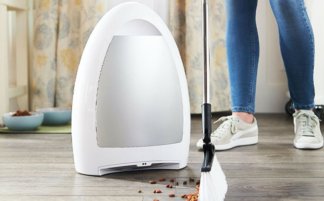 Woman Using EyeVac Home Touchless Sensor Activated Vacuum
